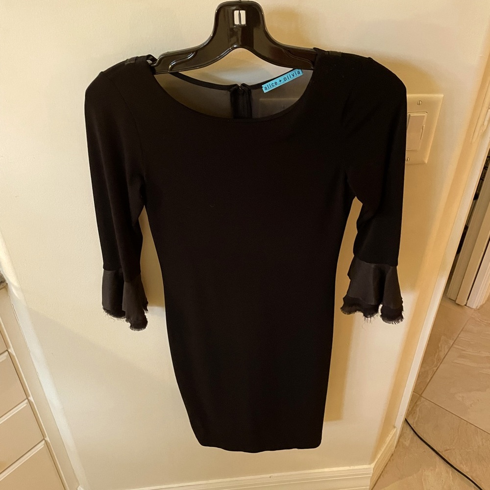 Beautiful black XS Alice & Olivia dress with leather sleeves.  Great condition!